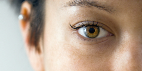 A close-up image of an human eye.